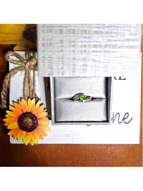 Elegant Peridot and White Sapphire Ring